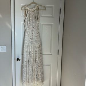 Venus BOHO style long dress with two slits in front.